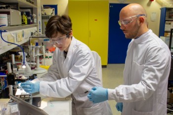 Dr Maiwenn Kersaudy-Kerhoas and Alfredo Ongaro working in the lab with PLA